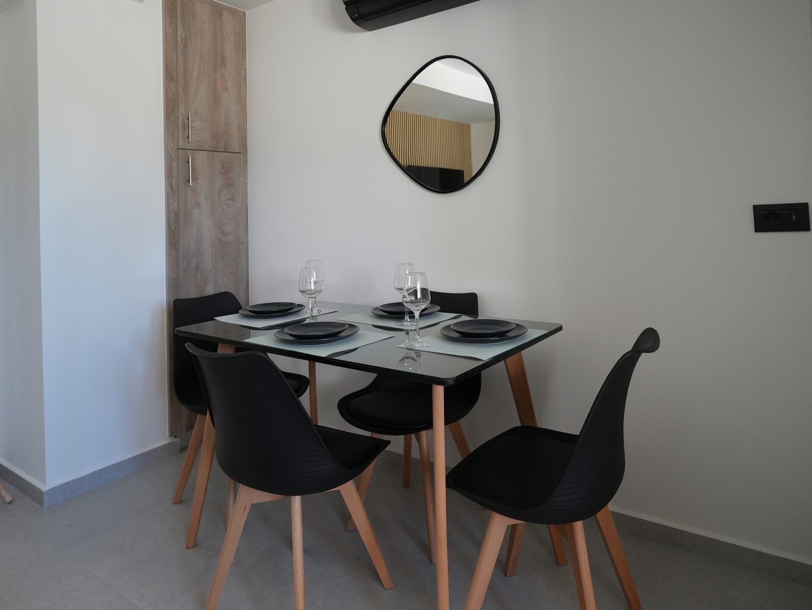 Dining table set for four