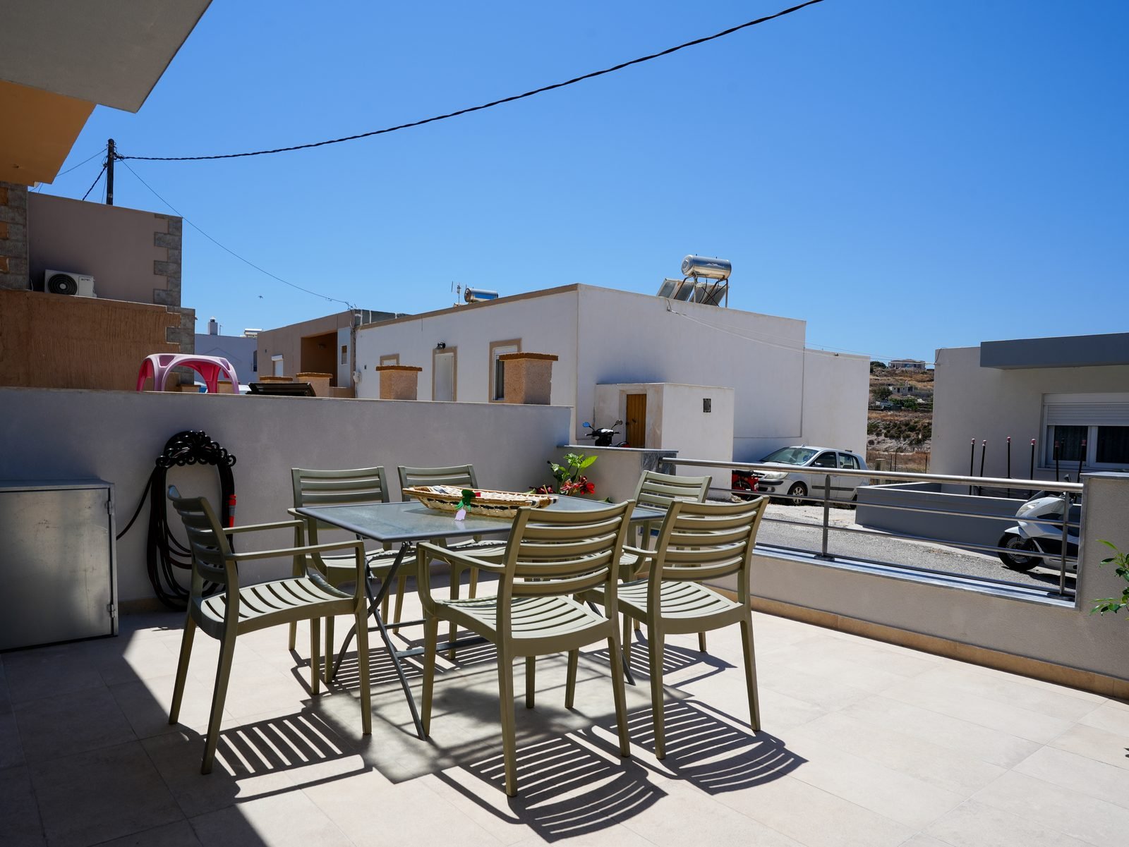 Terrace with seating and village view