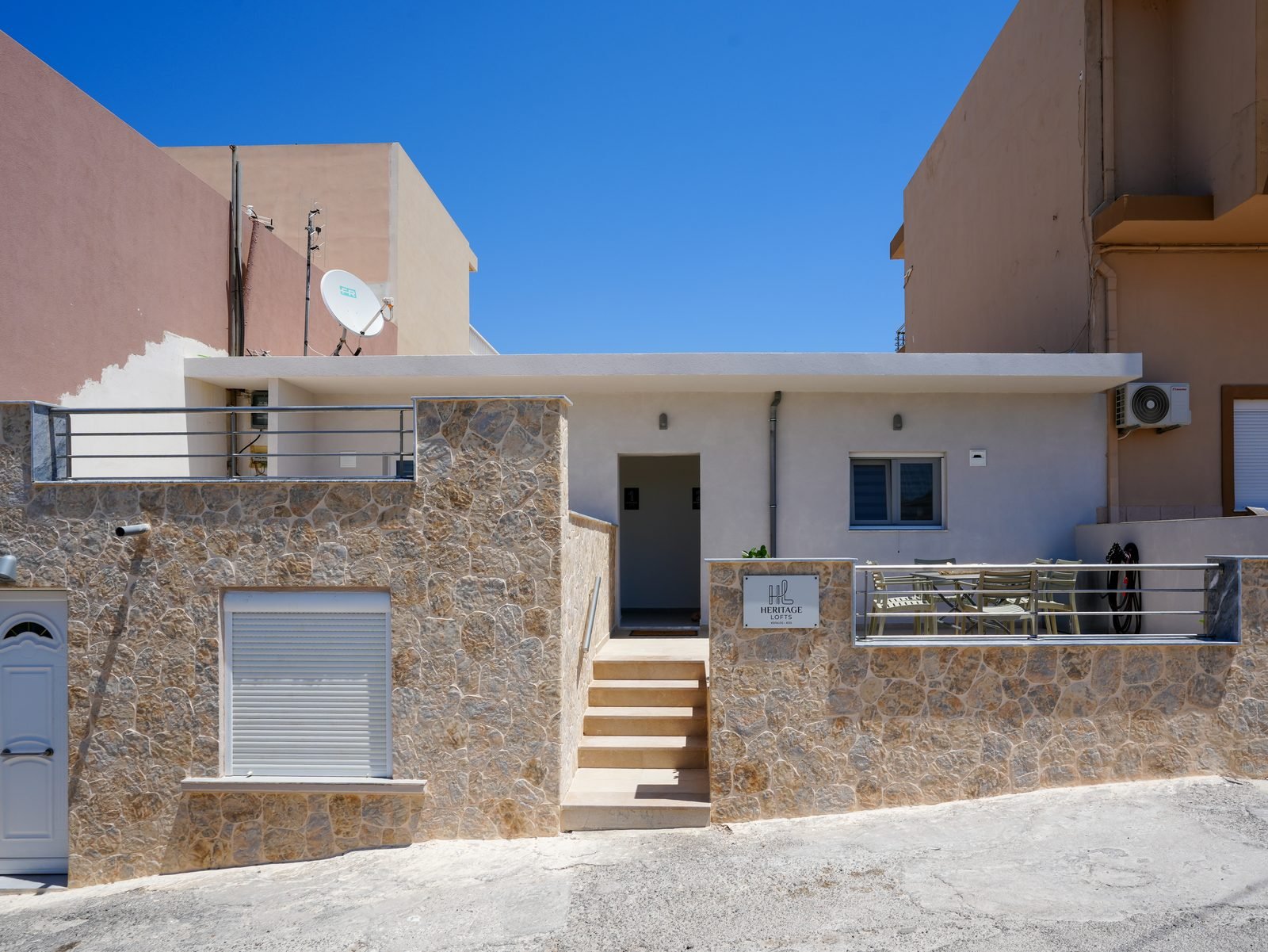 Heritage Lofts stone exterior in Kefalos village